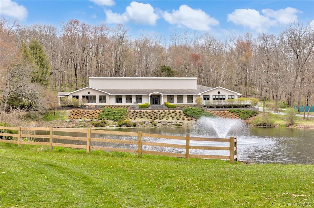 The Auditorium, a multipurpose space with seating for 350, stage area, translation booth and more, set in a tranquil setting