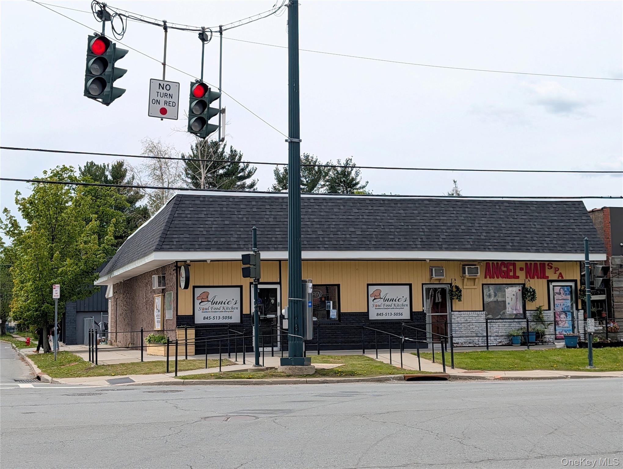 Busy corner on Broadway at light