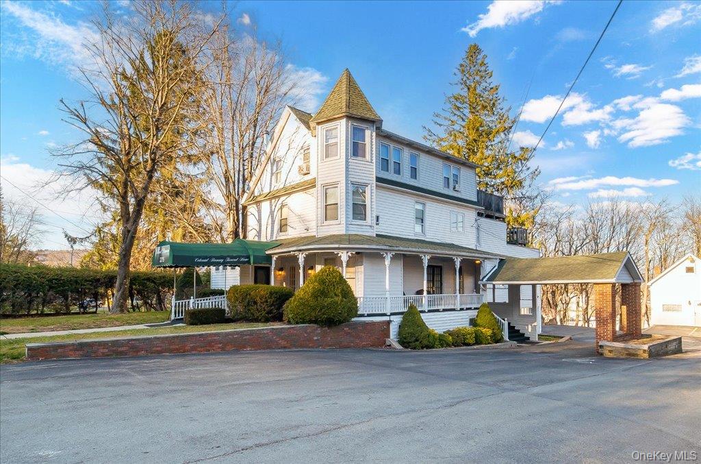 View of front of property with a porch