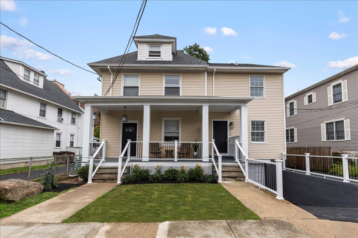 View of front of property. Unit A is the left side.