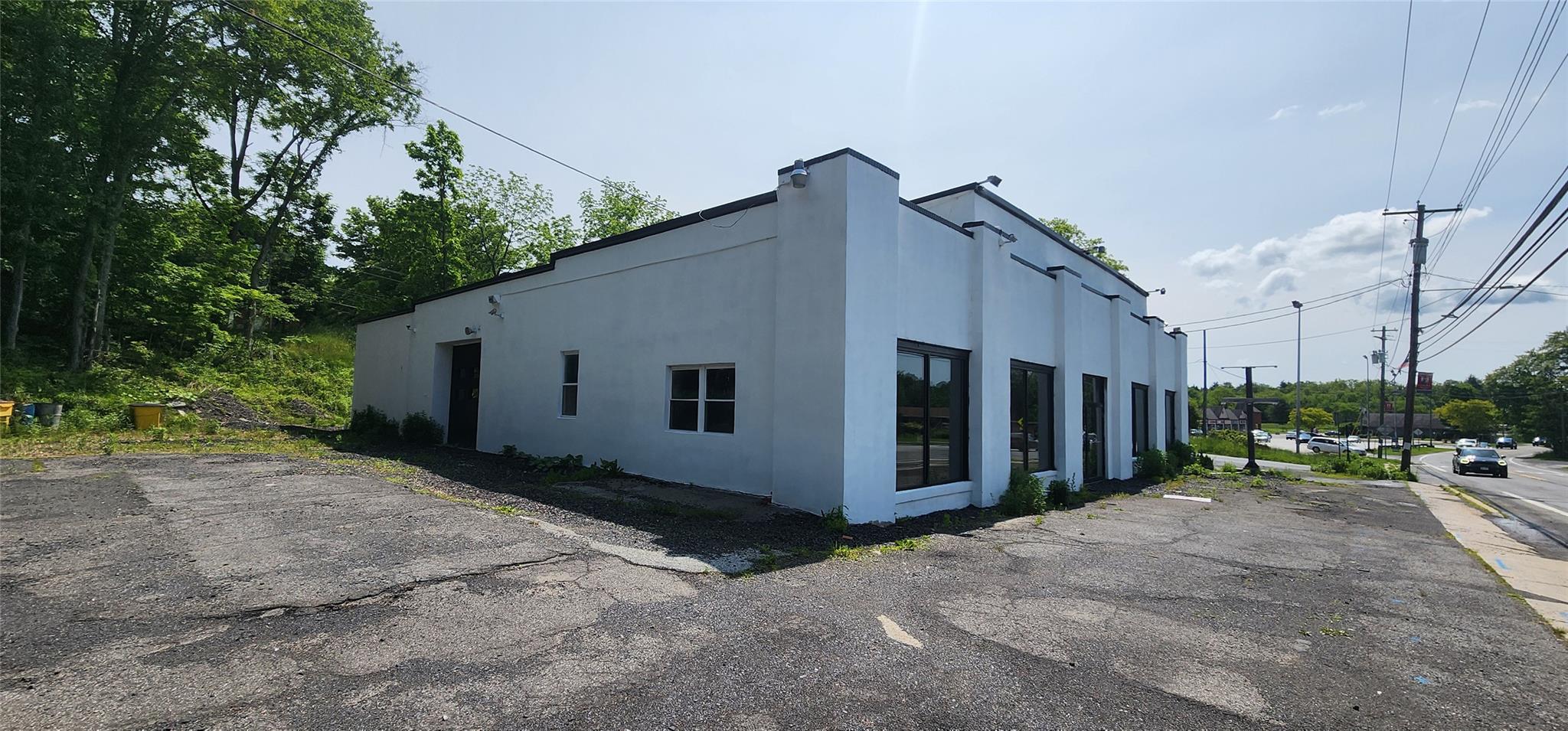 View of home's exterior featuring stucco siding