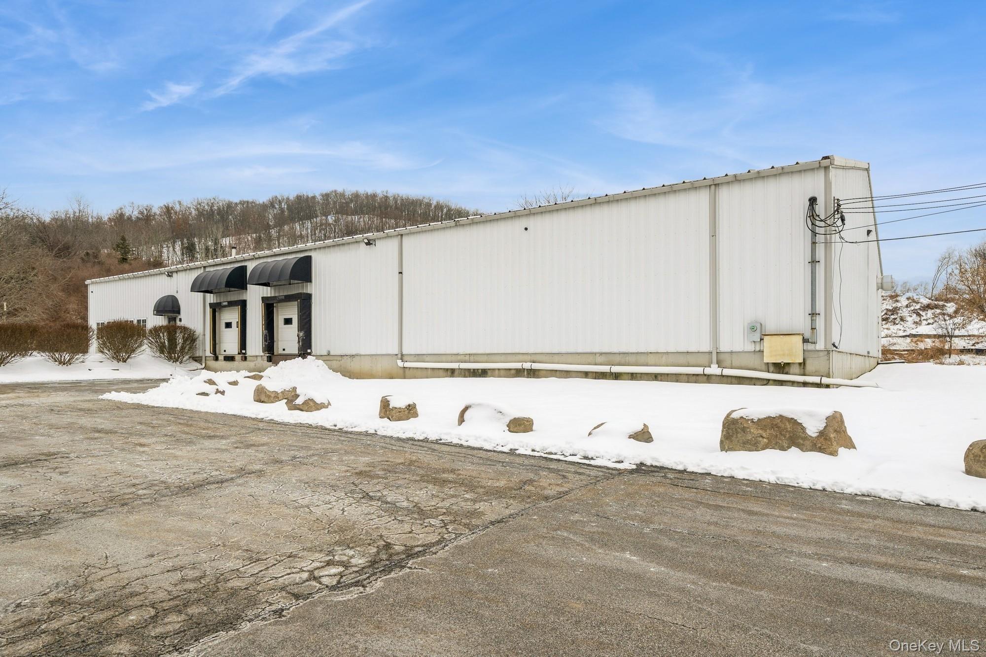 Front of Structure with parking lot.