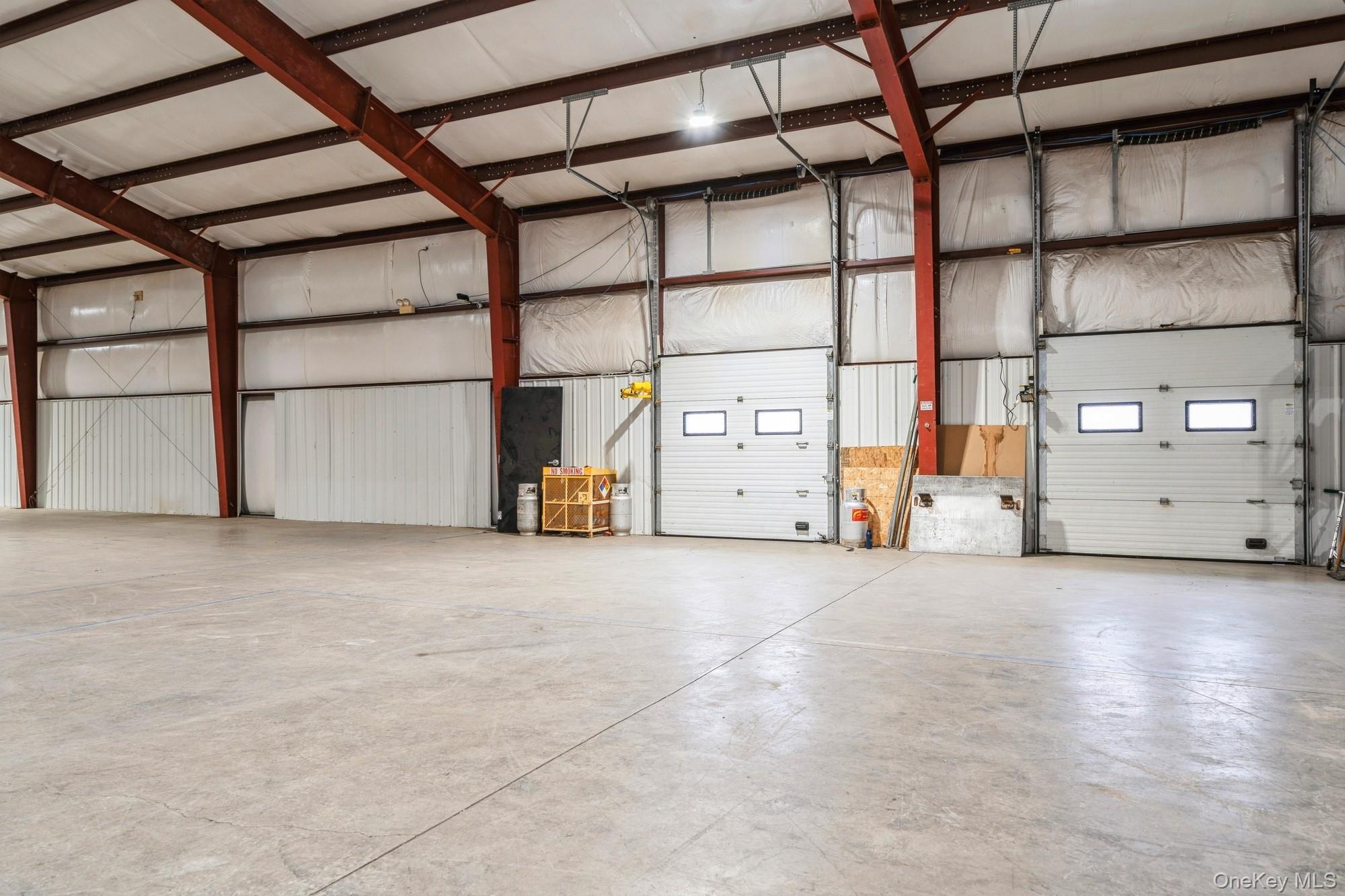 Interior view of warehouse with loading docks.