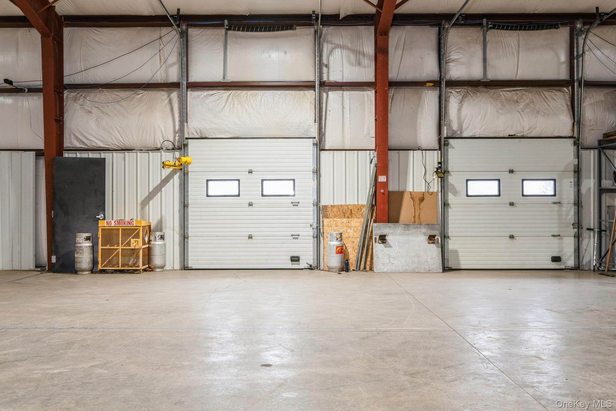 Interior view of warehouse with loading docks.