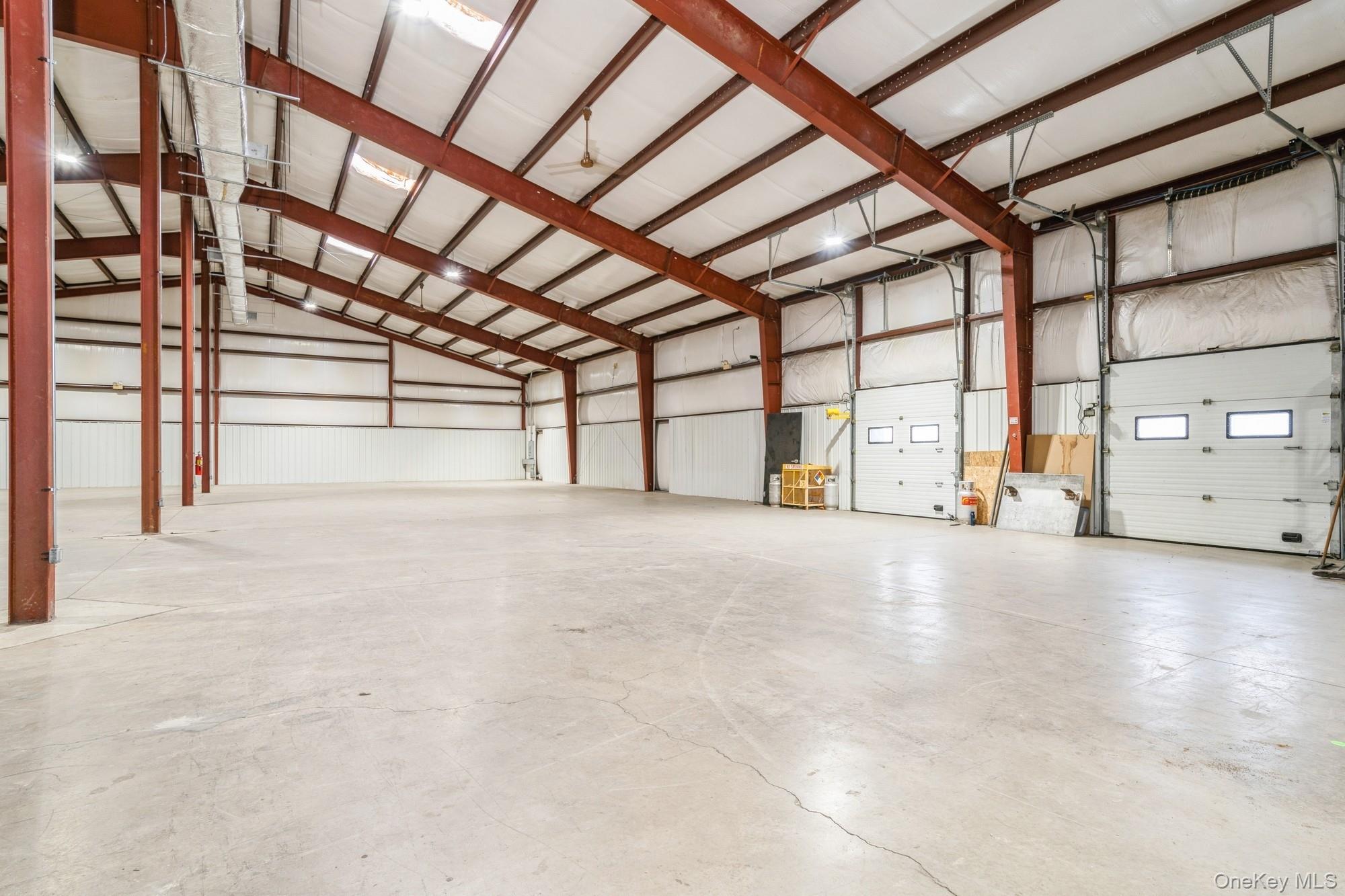 Interior view of warehouse with loading docks.