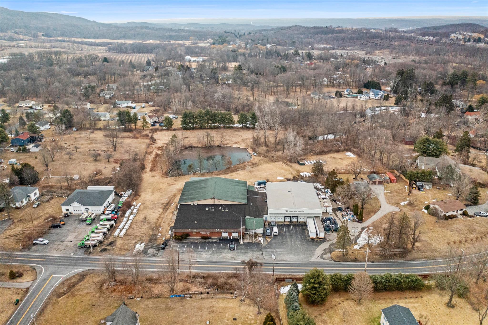 Birds eye view of property with a mountain view