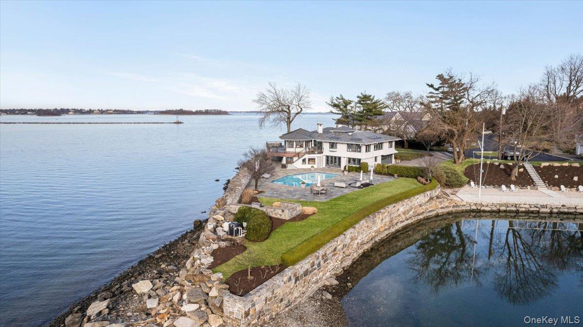 Captivating waterfront property positioned on the only peninsula on Manursing Island