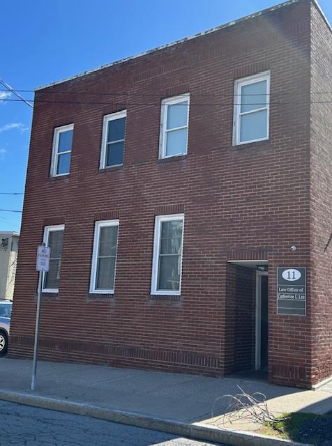 Front view of the brick building.