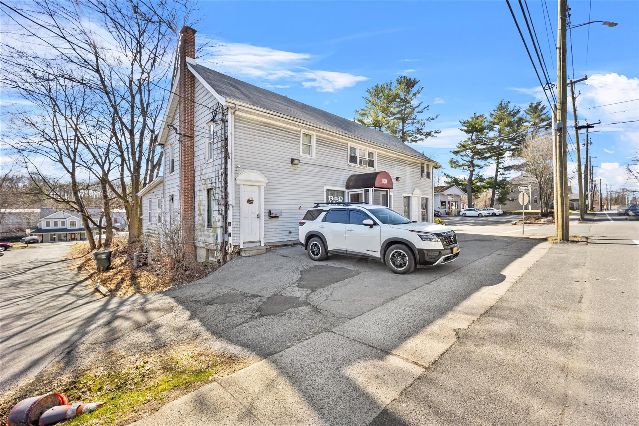 View of front of home with a chimney
