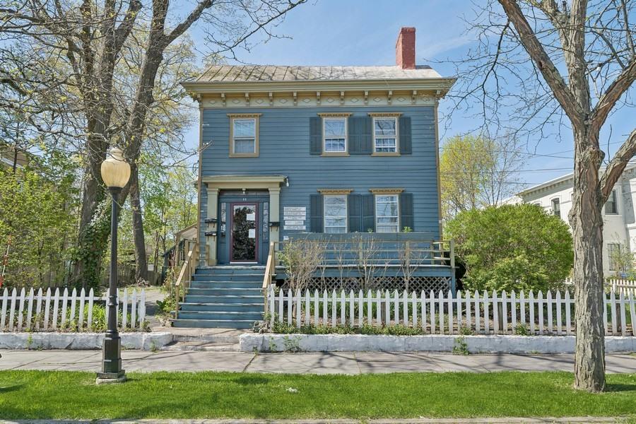 Front of 11 Webster Avenue showing stairs up to front door and lobby.