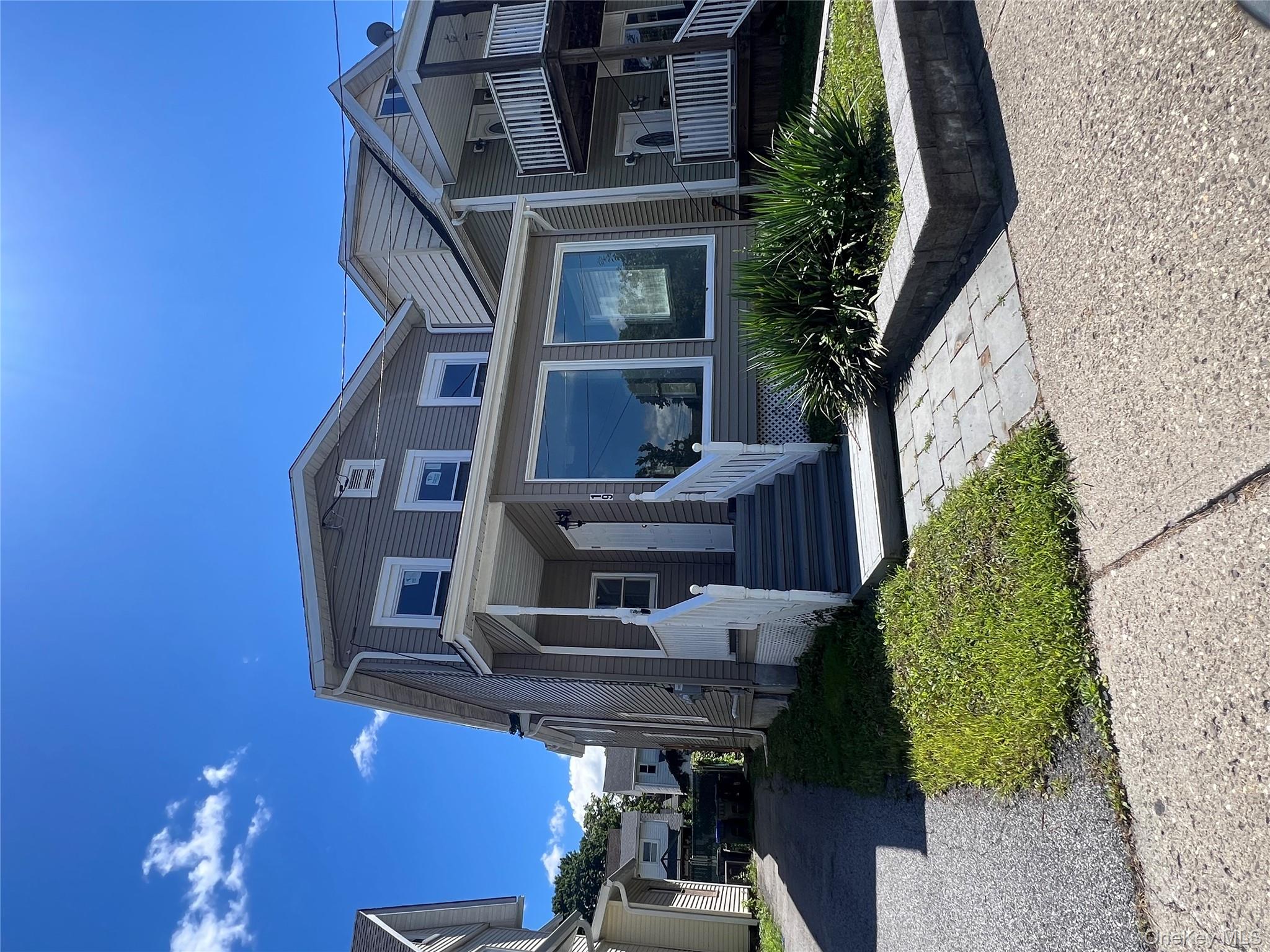View of front of property featuring covered porch