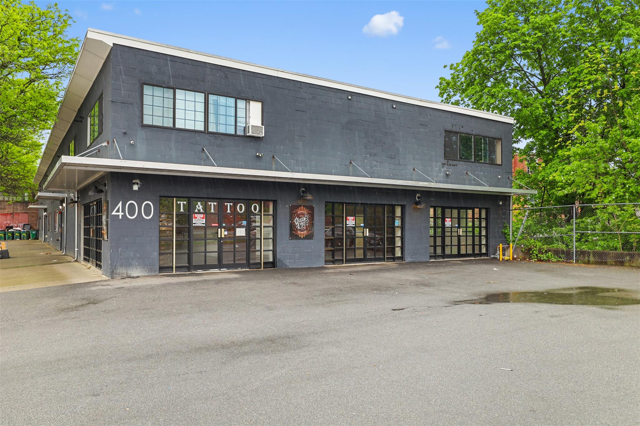 View of building exterior with fence