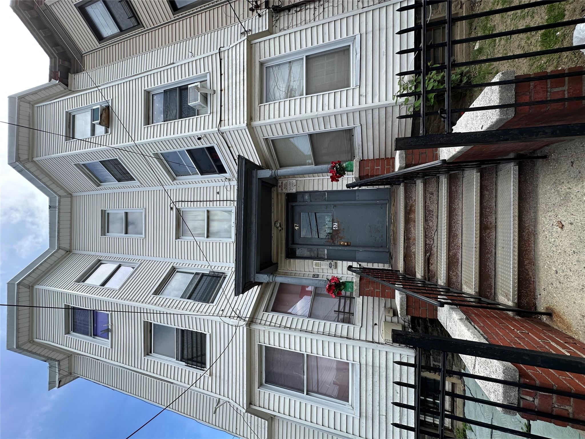 View of front facade with a fenced front yard