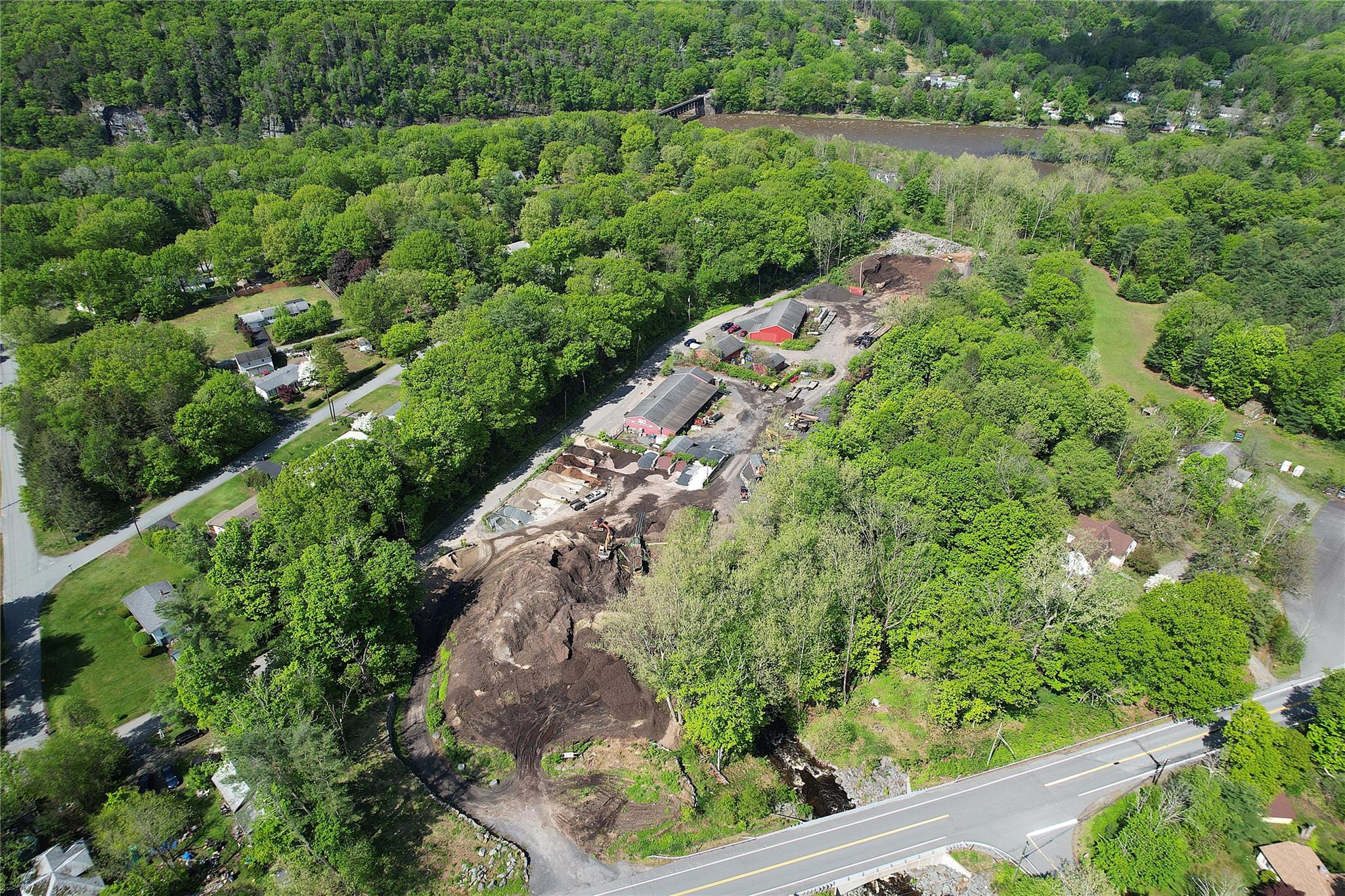 View of property location featuring a heavily wooded area