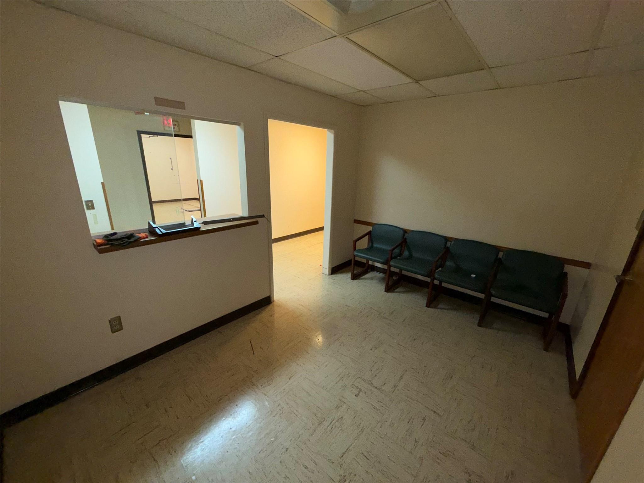 Entrance 1 into office waiting area and receptionist