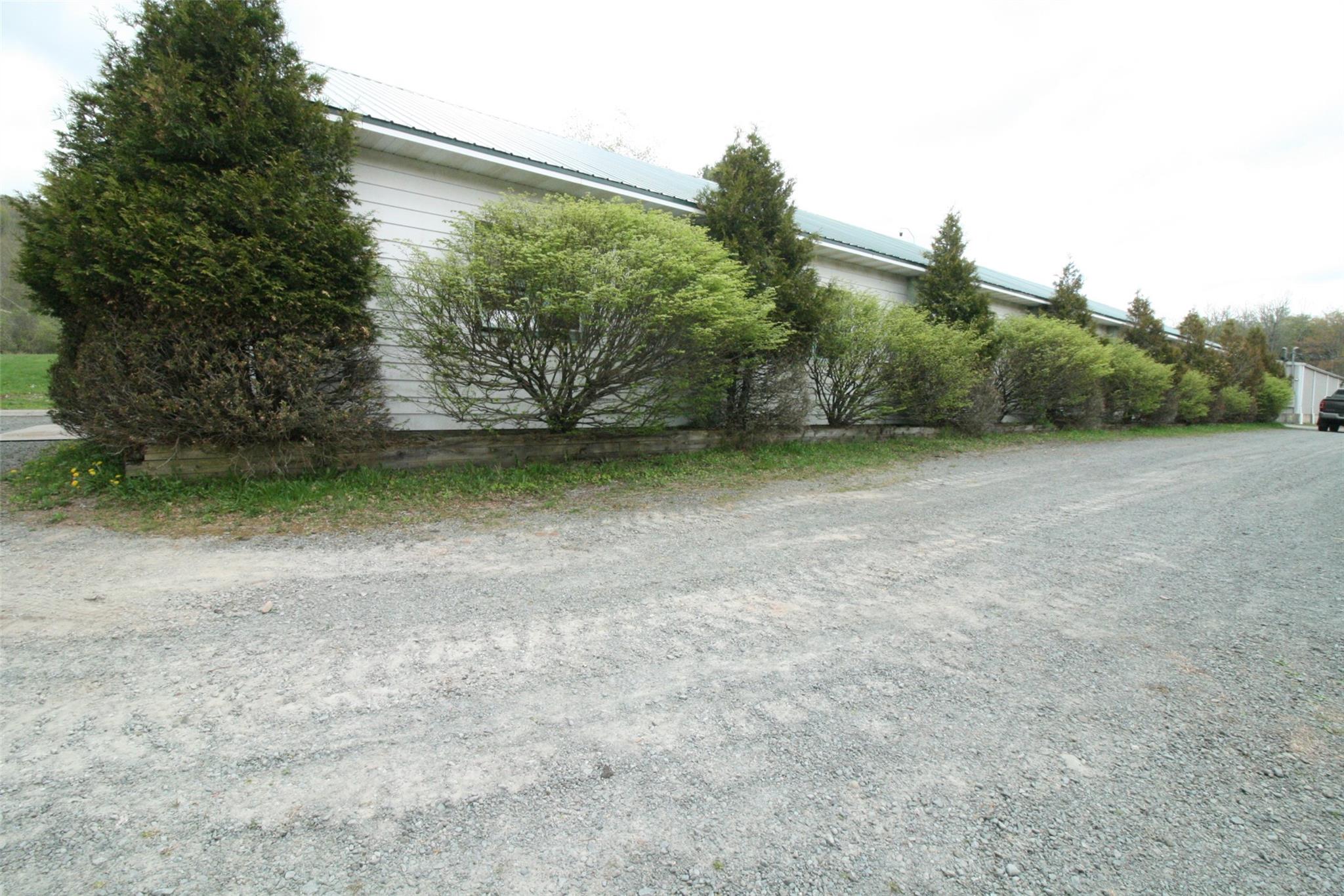 View of property exterior with metal roof