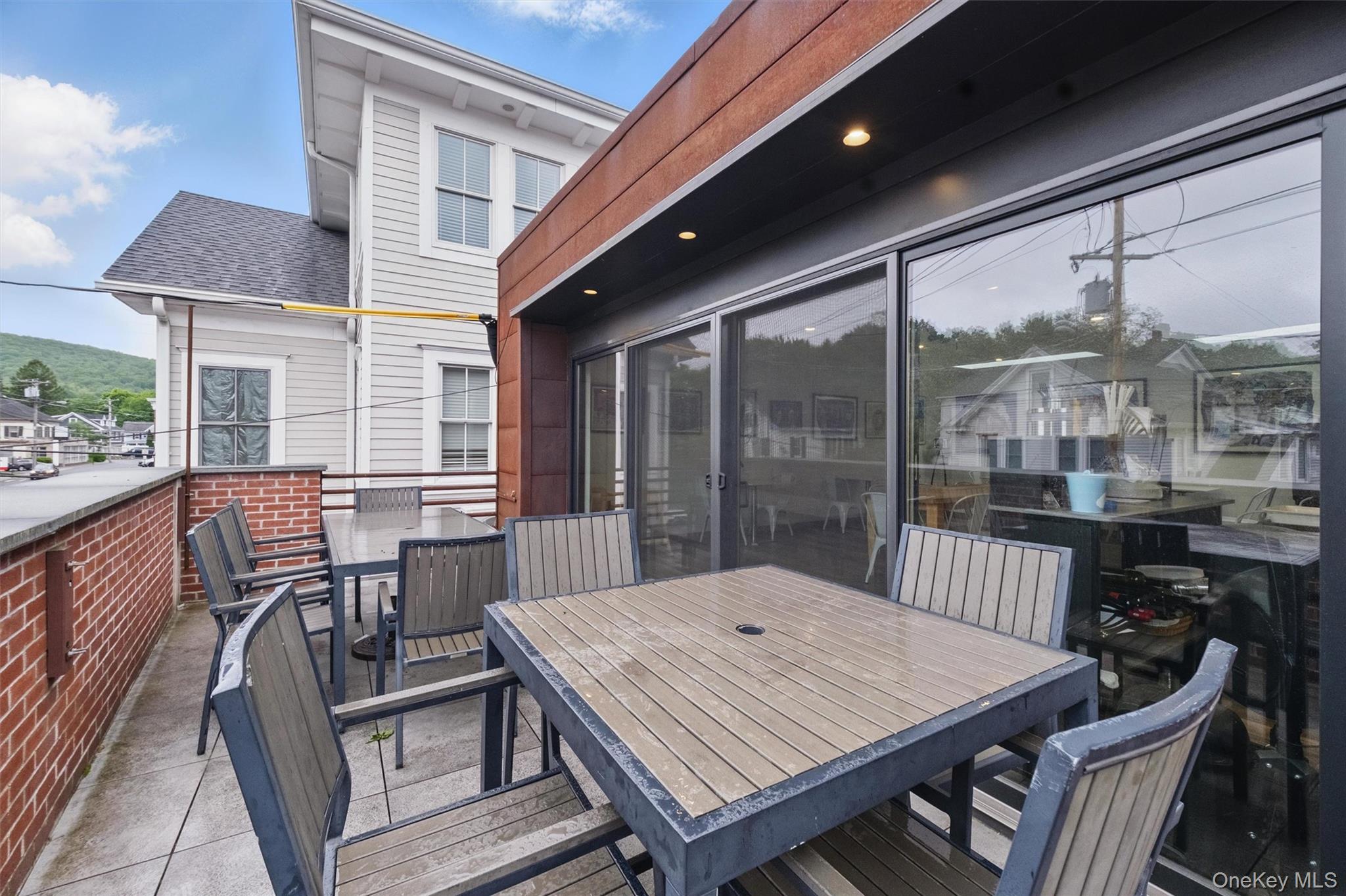 Wooden terrace with outdoor dining area