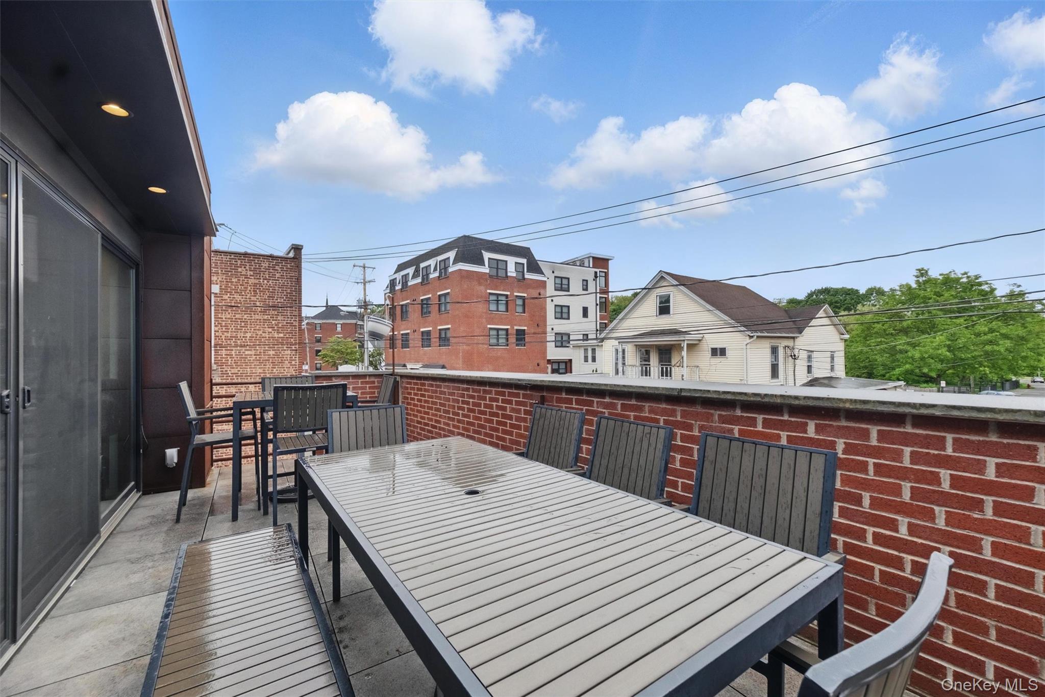 Balcony featuring outdoor dining space