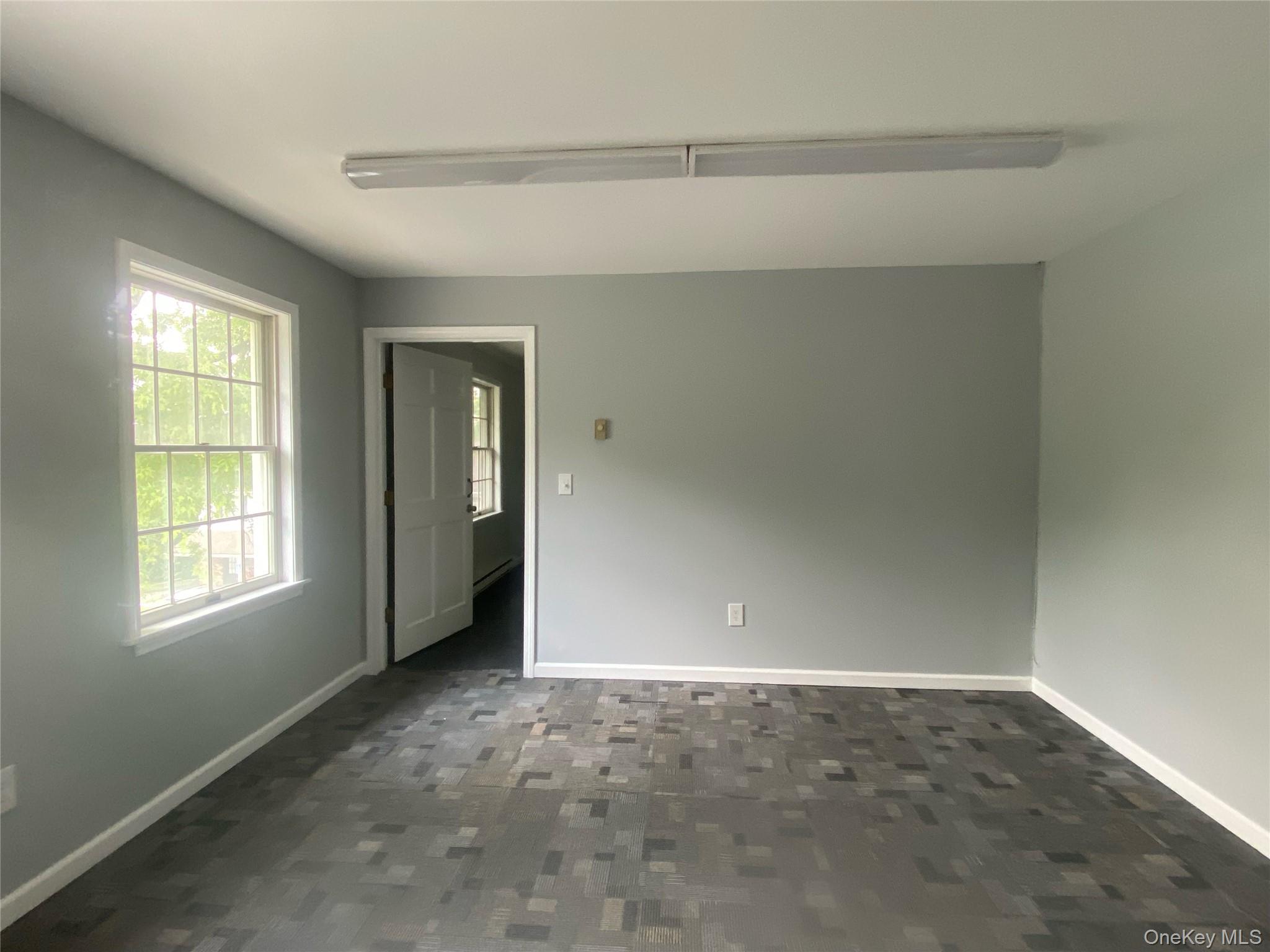 Spare room with baseboards