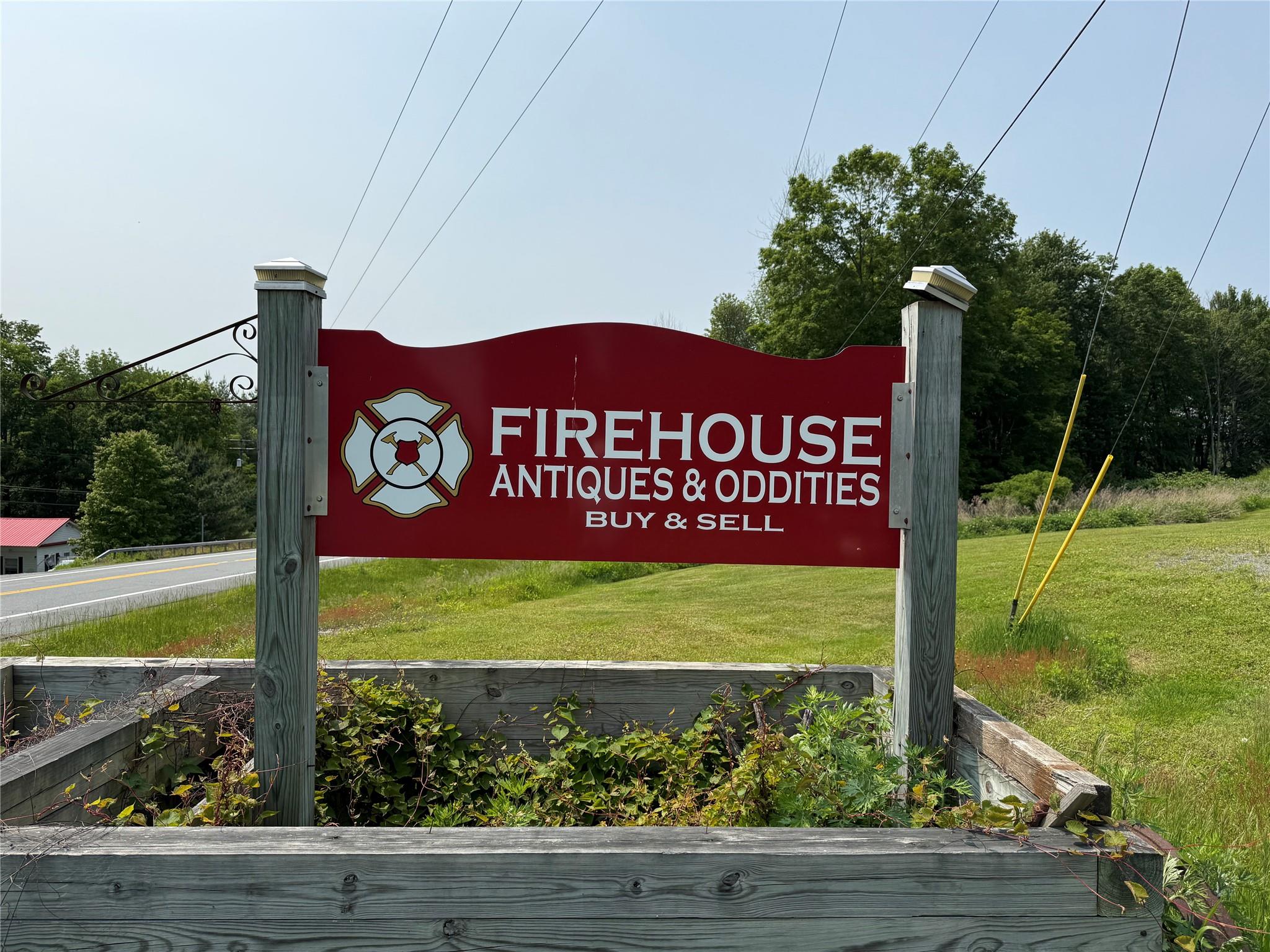Community sign featuring a lawn