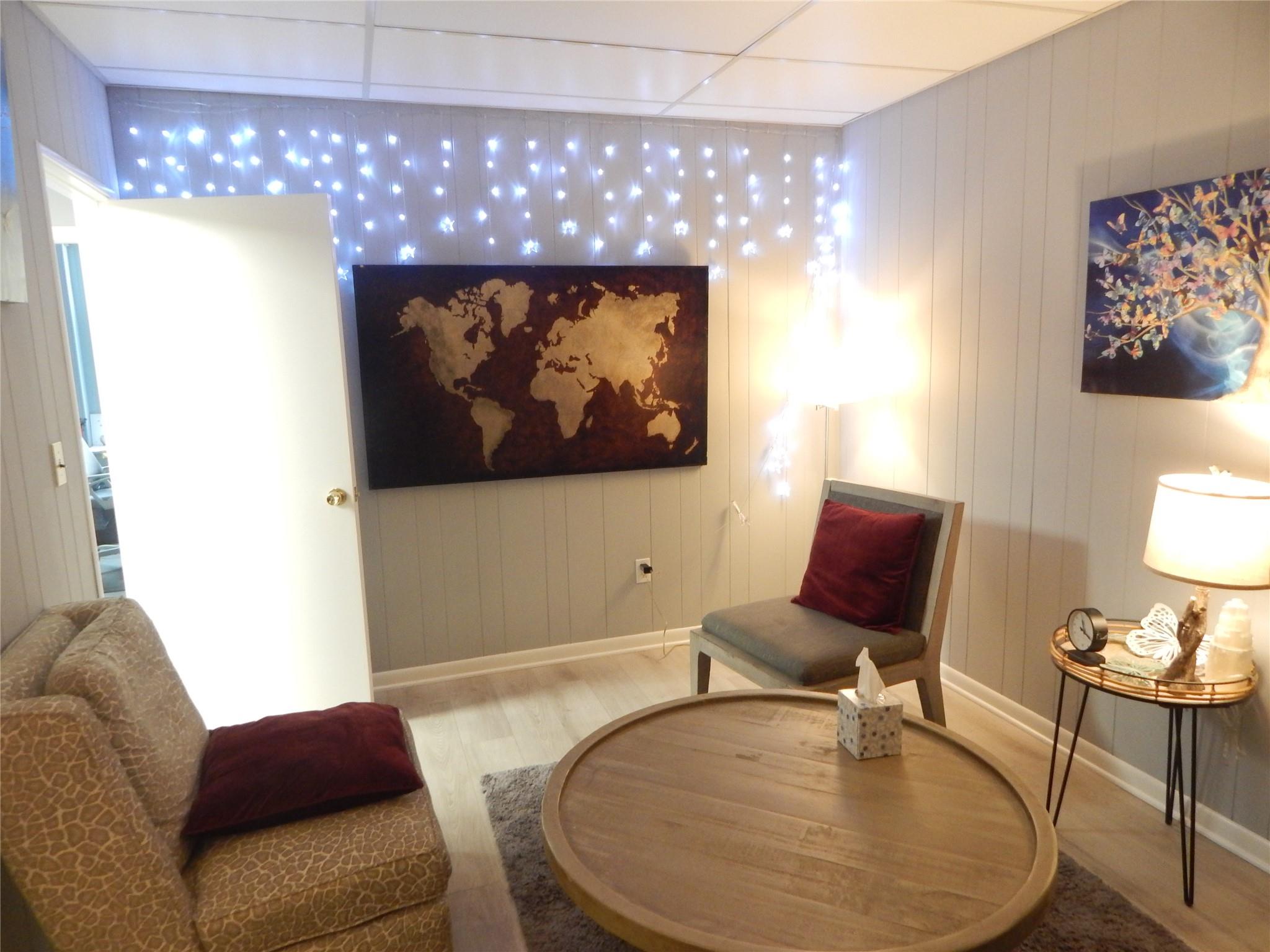 Sitting room with light wood-type flooring