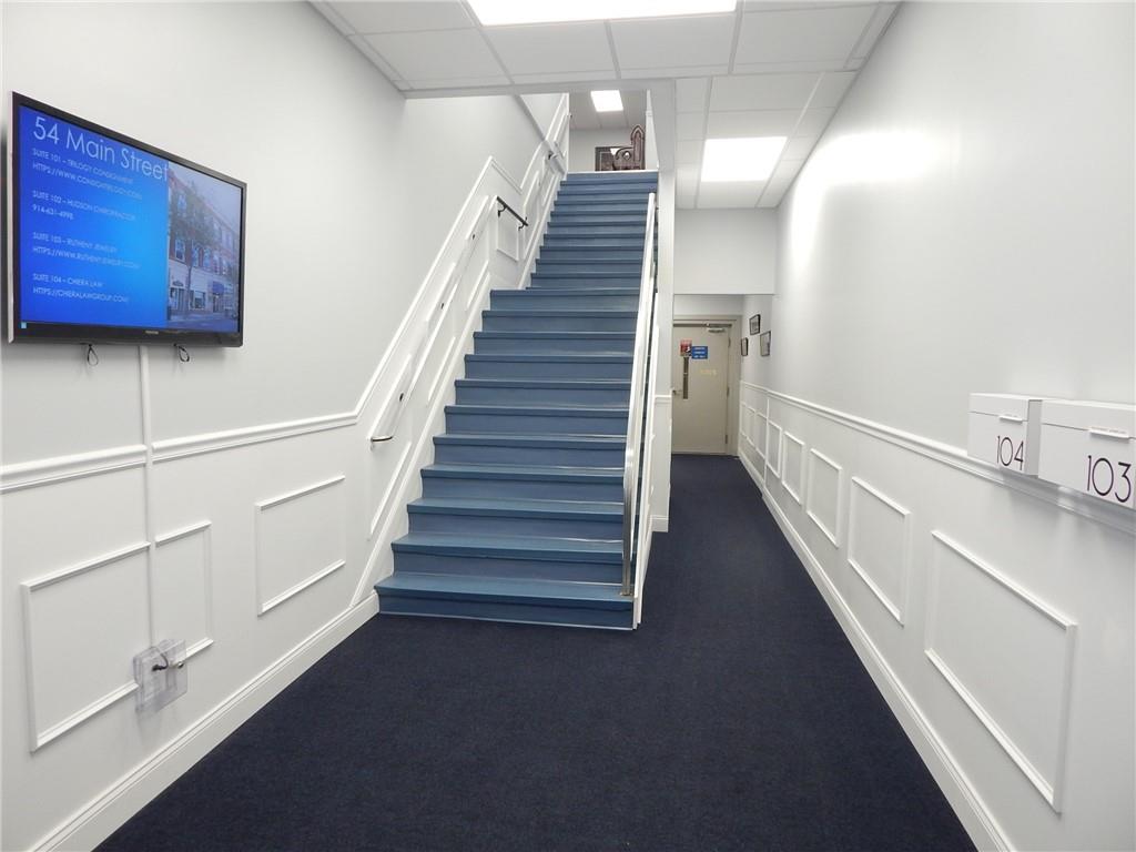 Entrance has been recently updated with media, paint and carpeting.