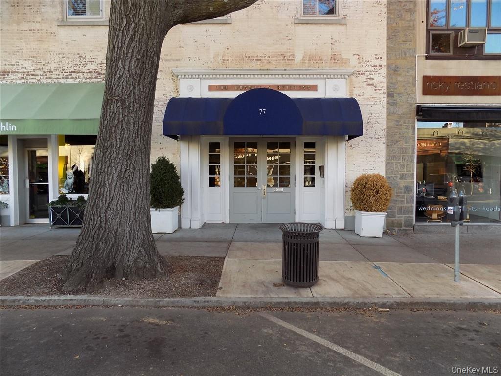 Entrance to property with french doors and brick siding