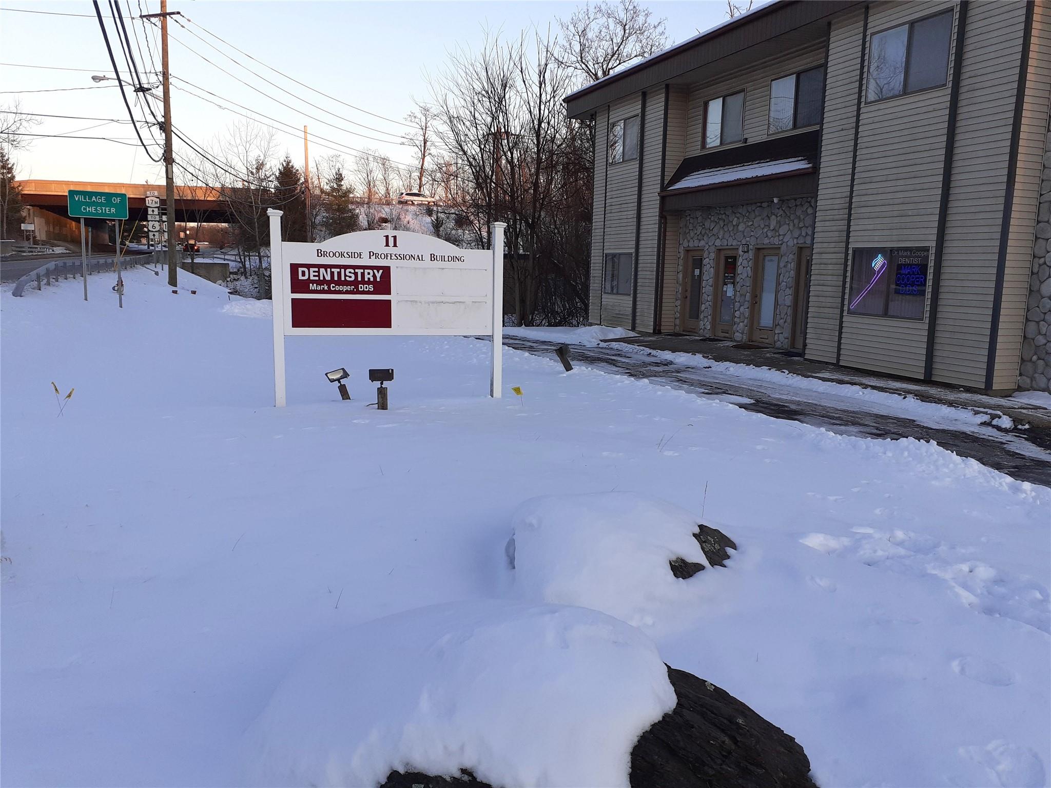 View of yard layered in snow