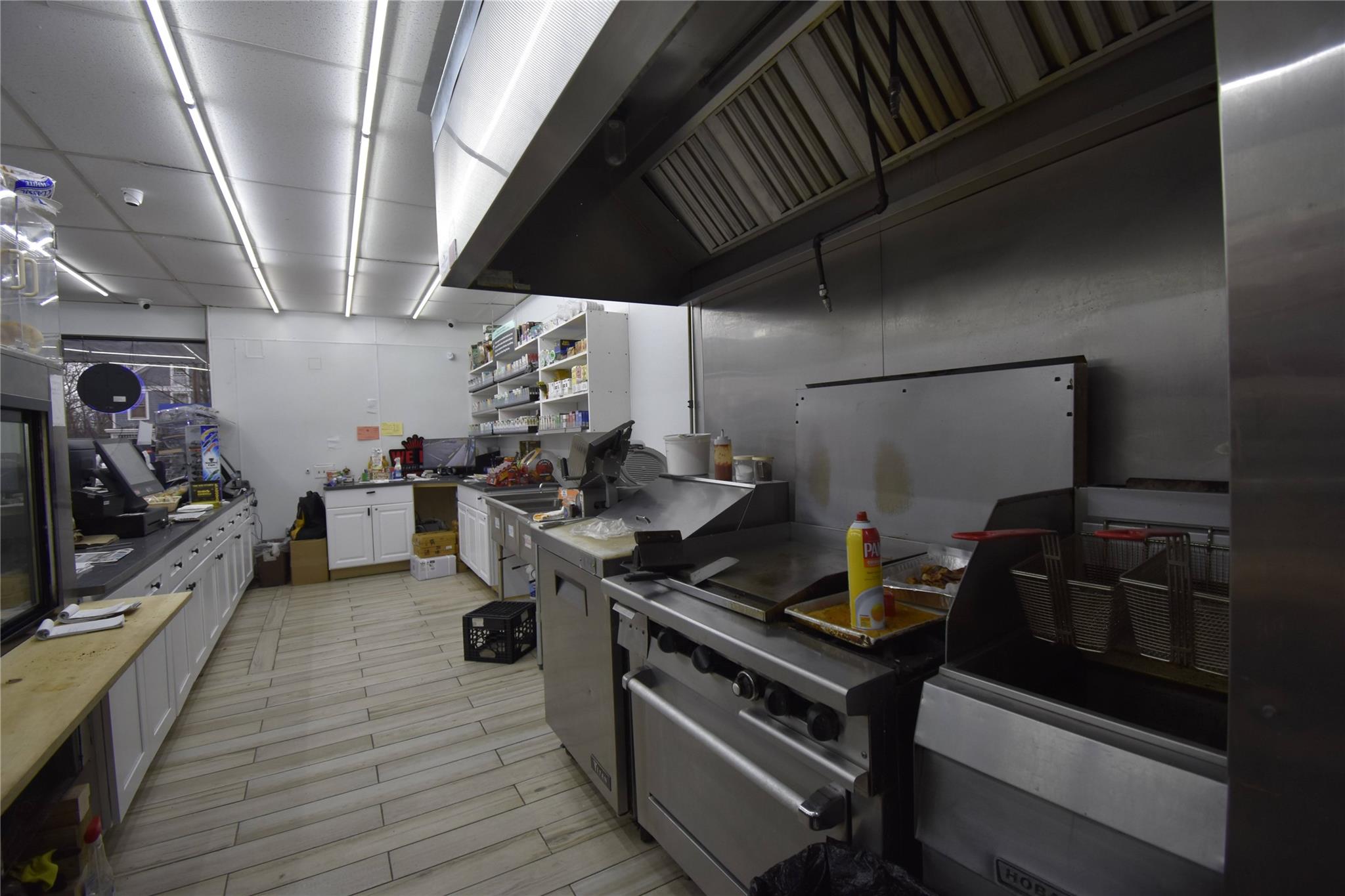 Kitchen with white cabinets and stove
