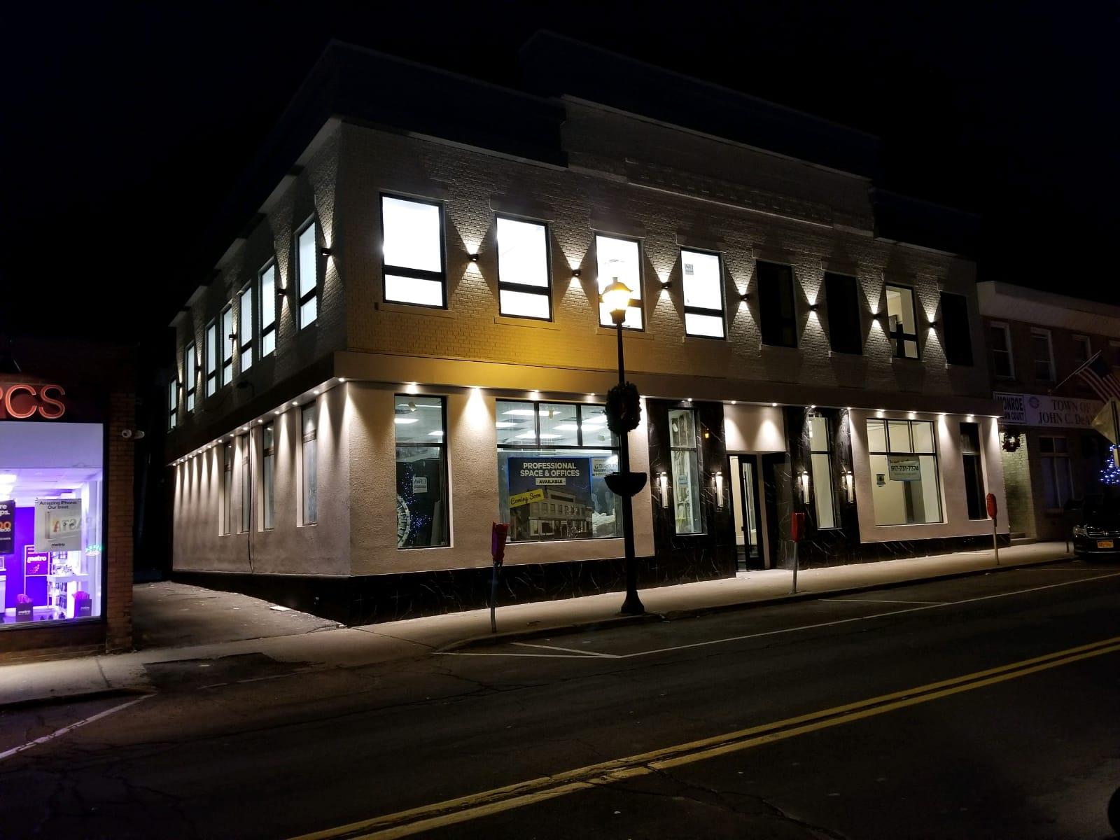 View of property at twilight