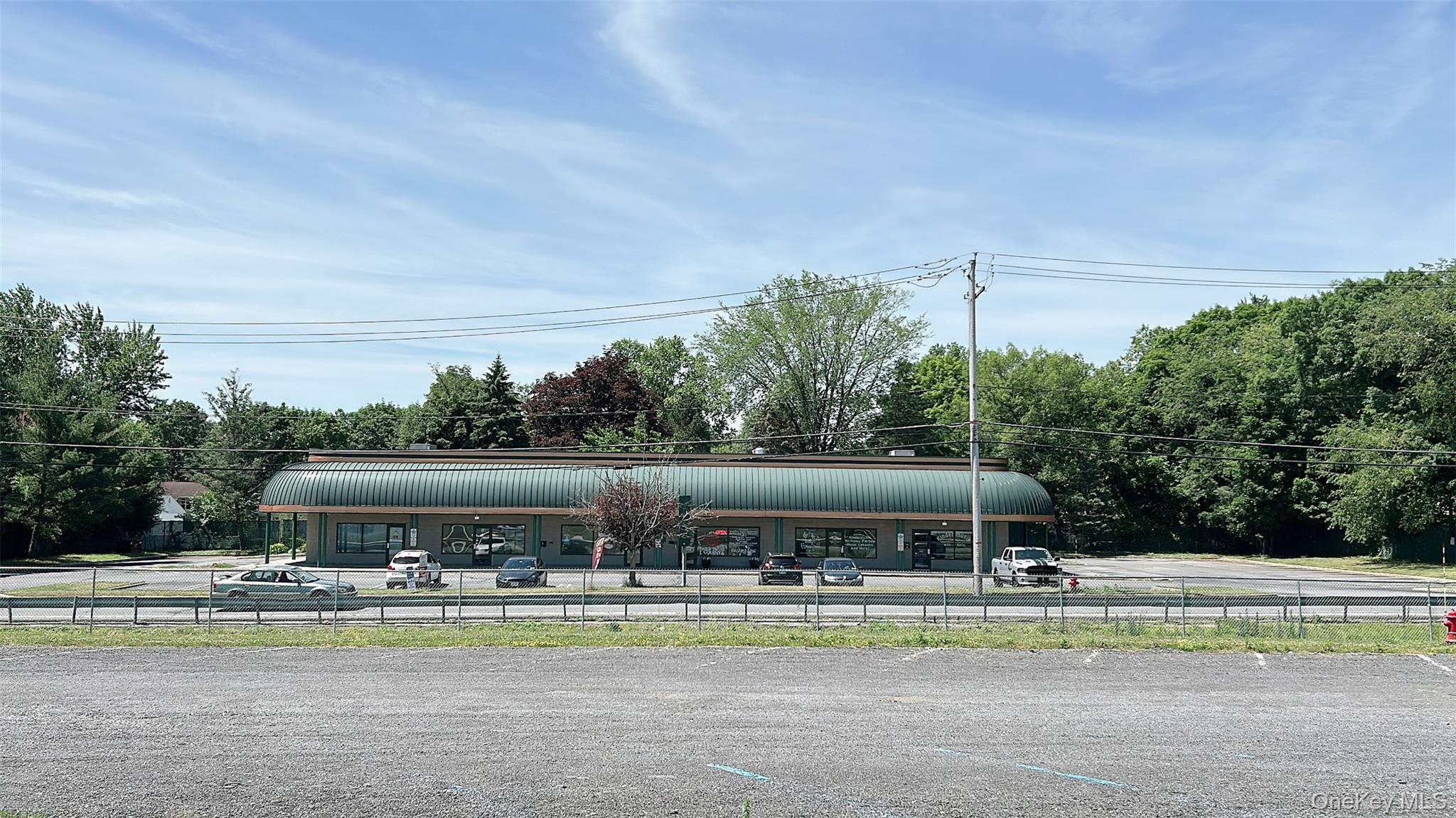 View of property's community featuring uncovered parking