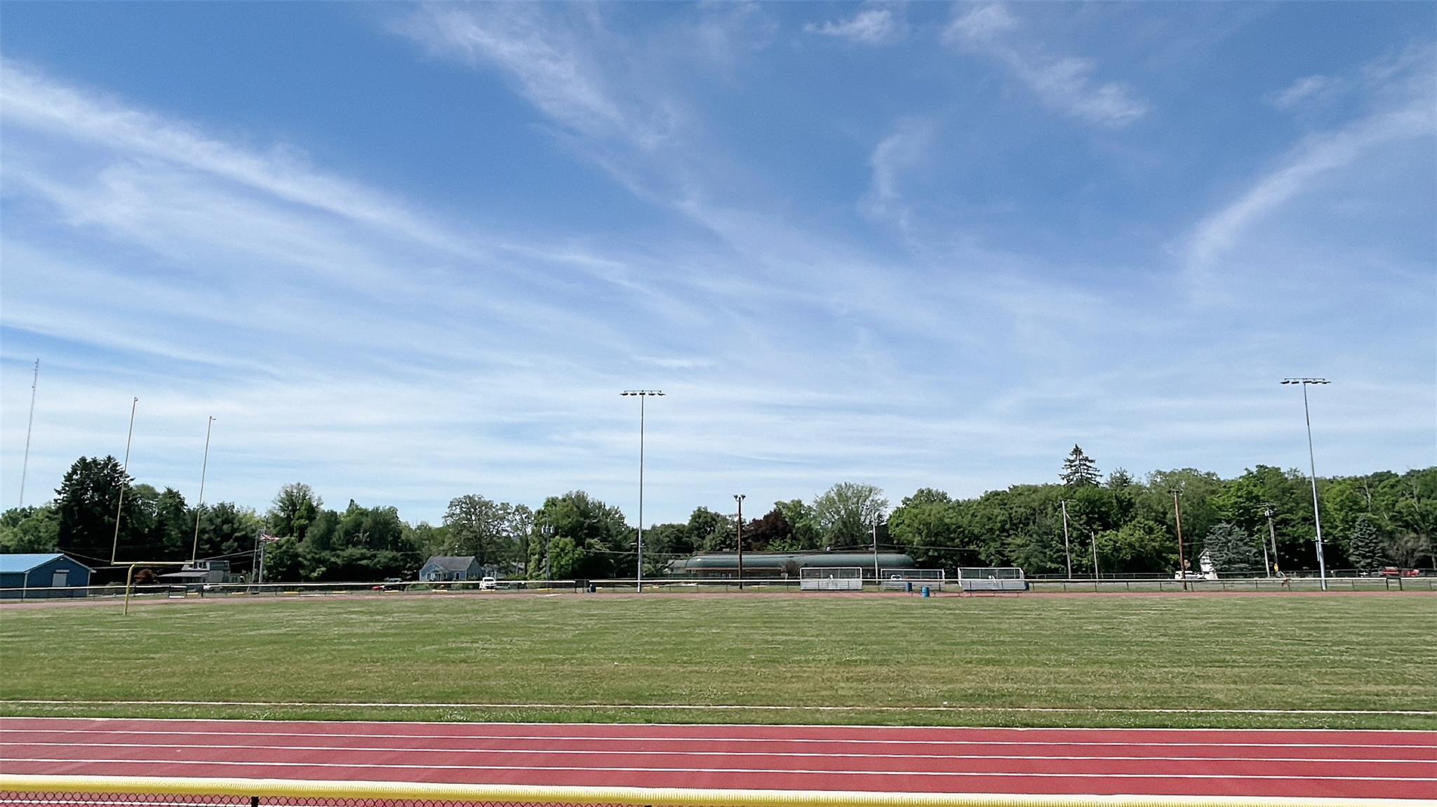 View of property's community with a sport area
