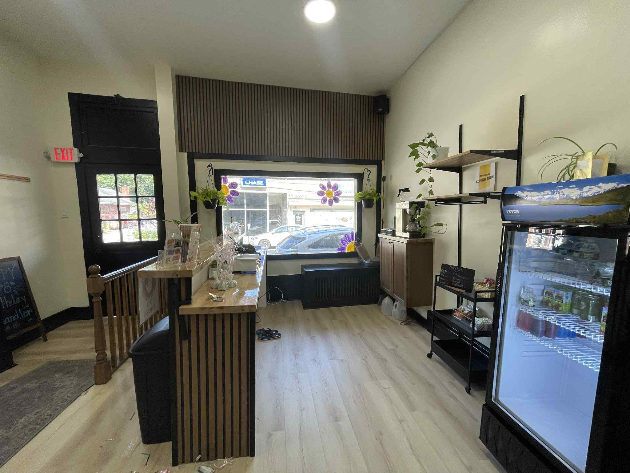 Office area with light wood-style floors