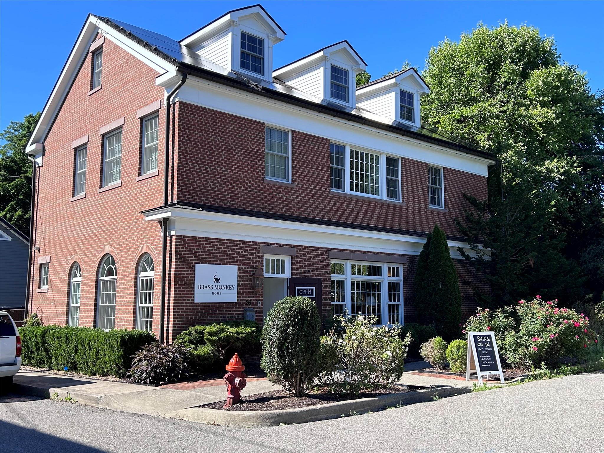 View of front of property featuring brick siding