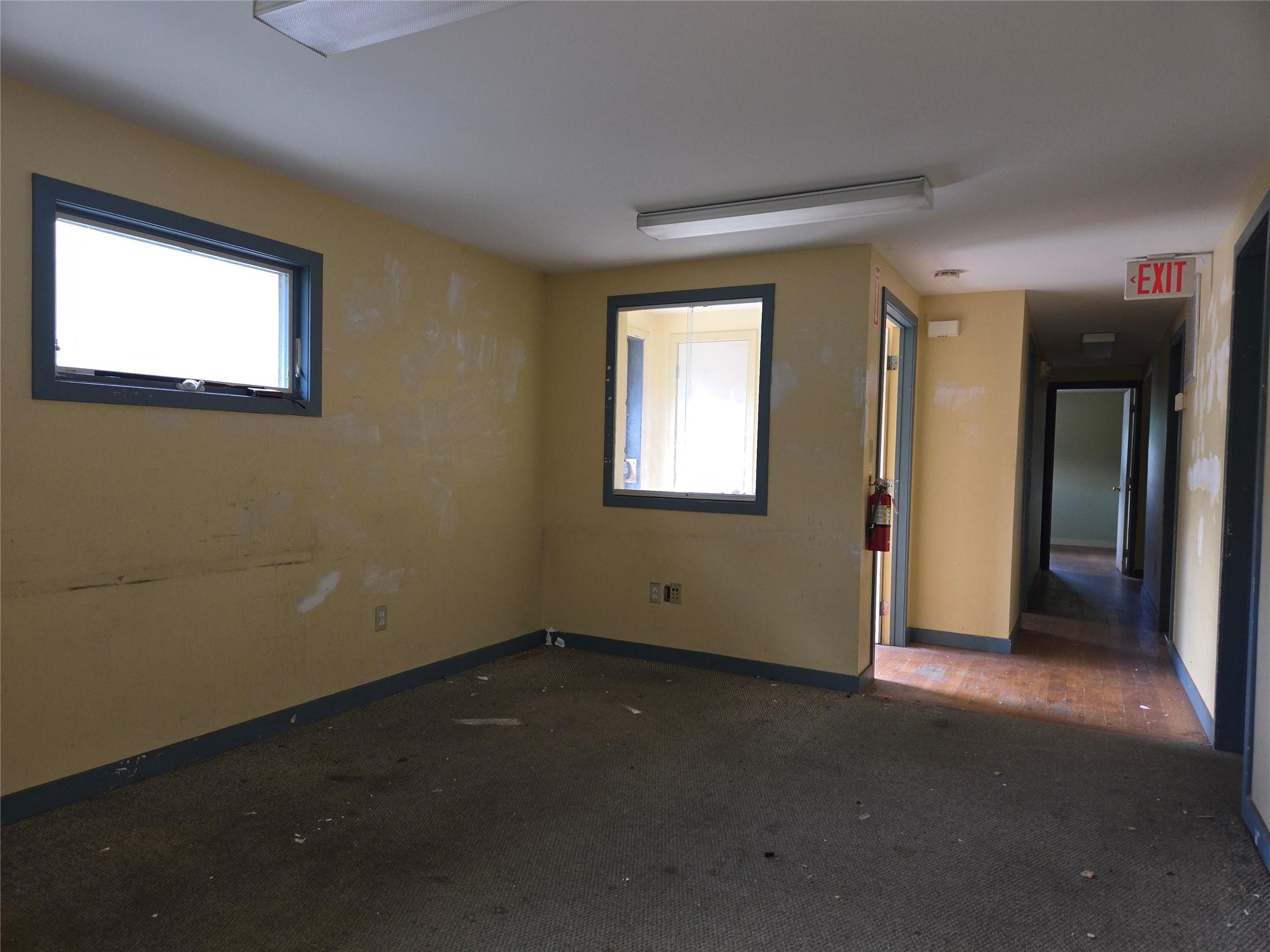 Unfurnished room featuring carpet flooring