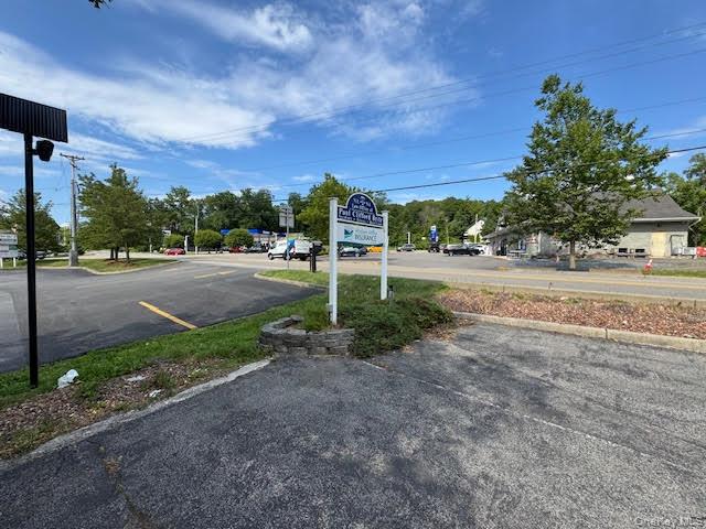 Parking area with sign.