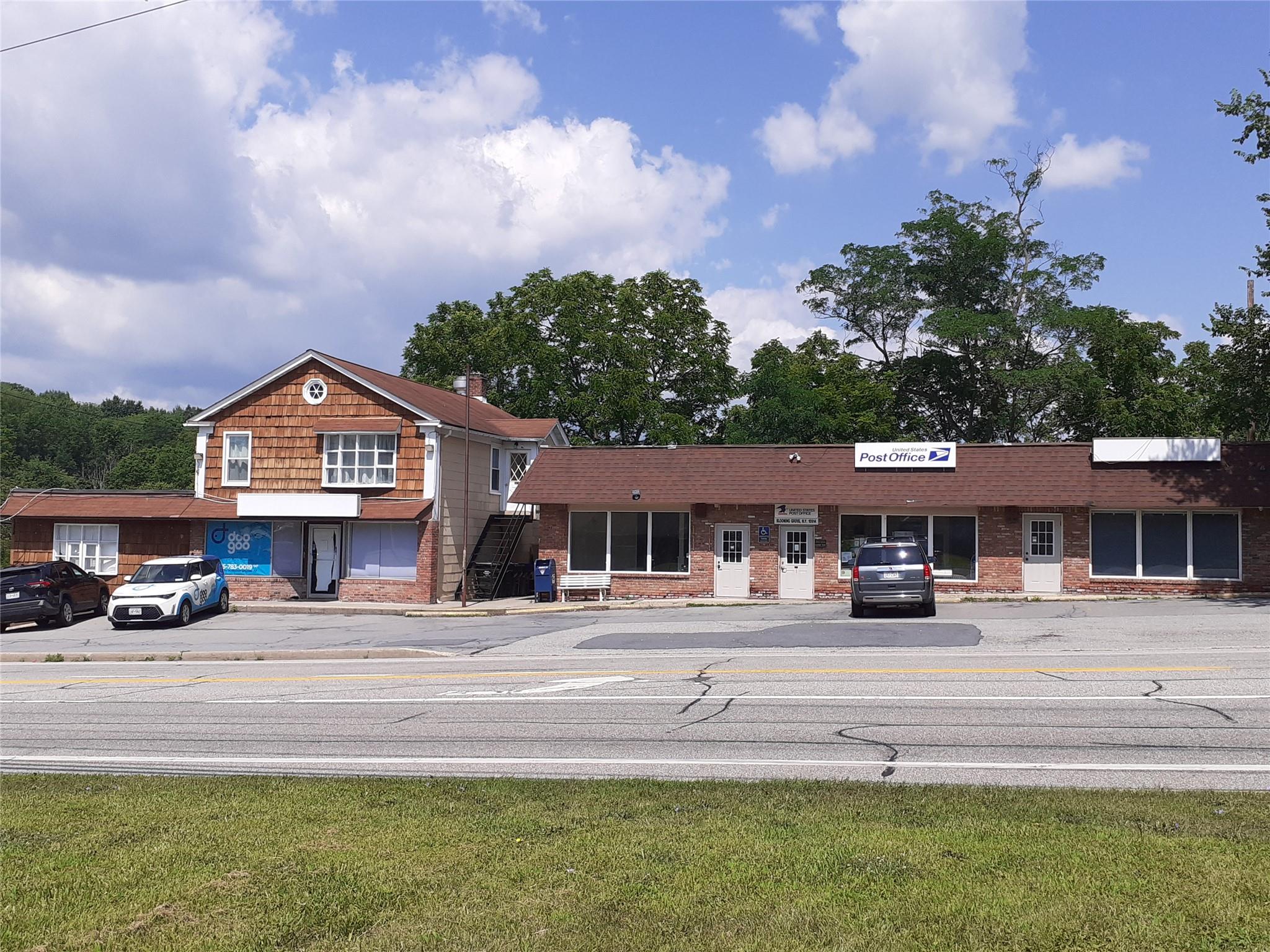 View of front of house featuring brick siding