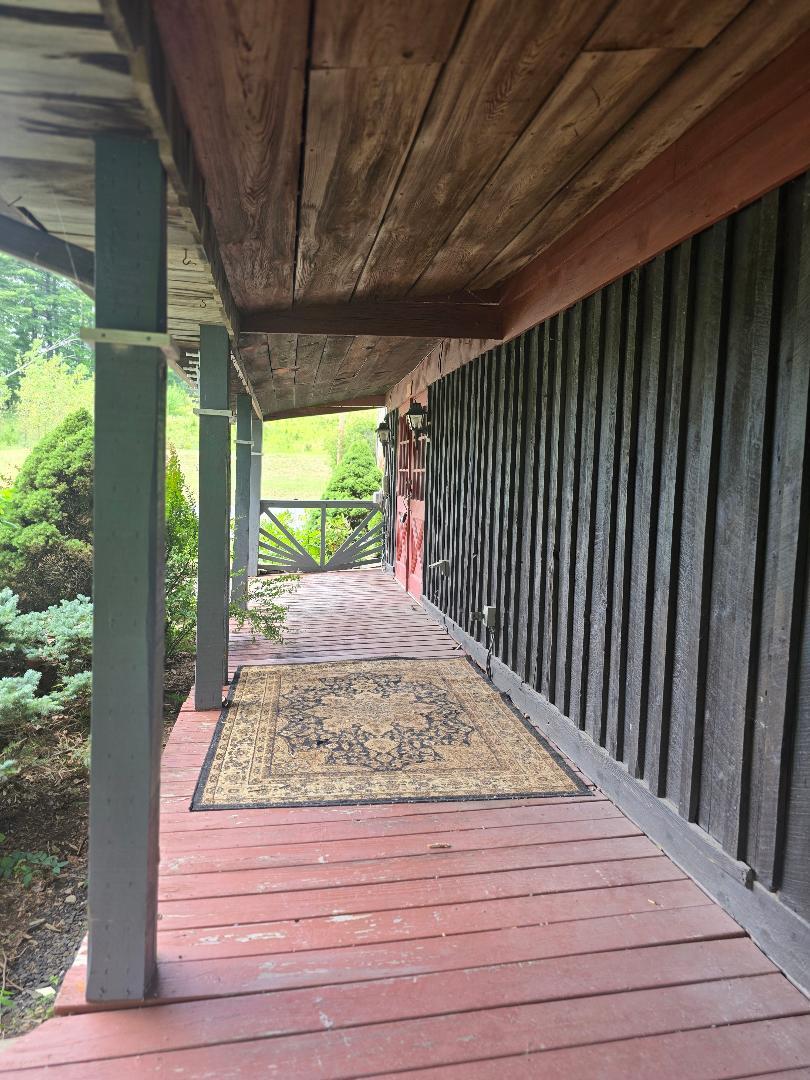 covered porch on south side of building