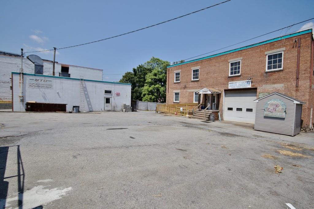 View of property featuring a garage