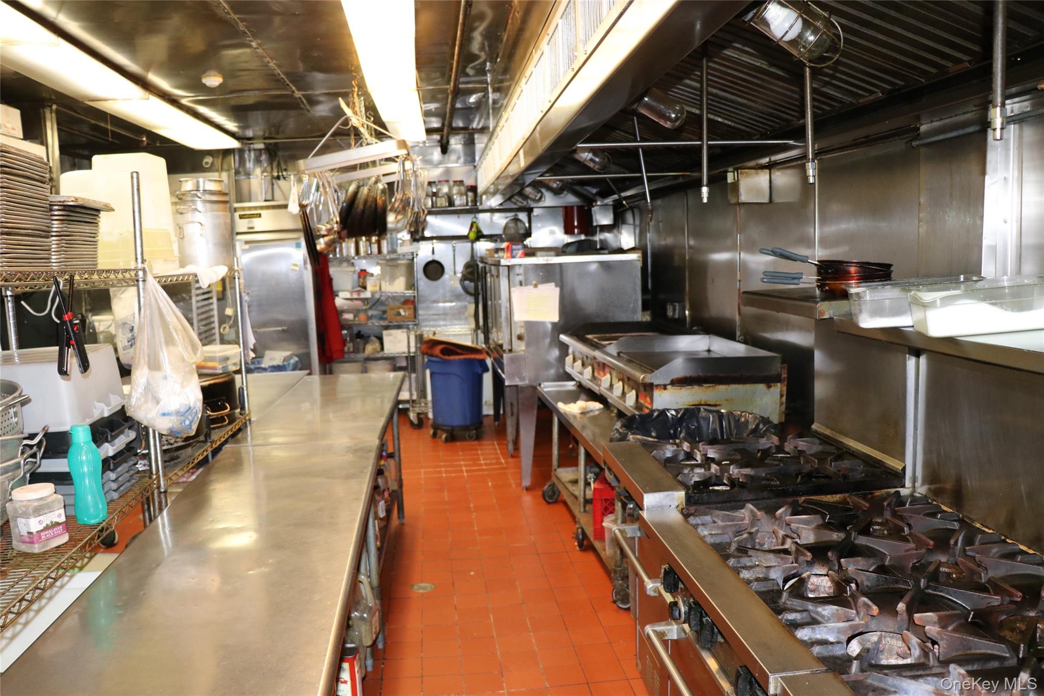 Kitchen featuring stainless steel counters and stainless steel gas stove