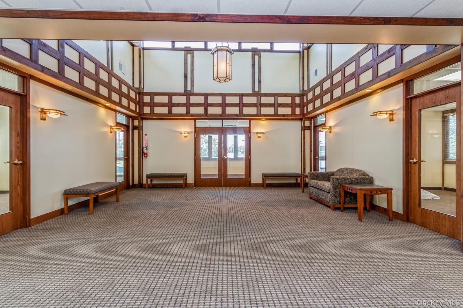 Building lobby featuring a towering ceiling