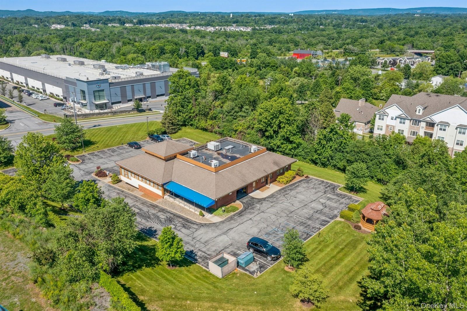 Drone / aerial view of a heavily wooded area