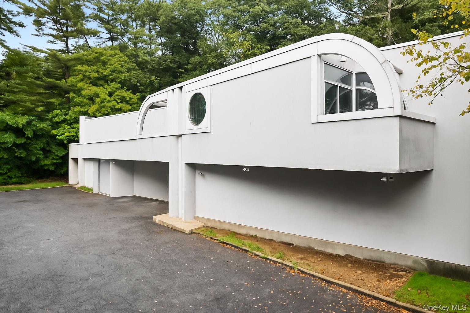 View of property exterior with stucco siding