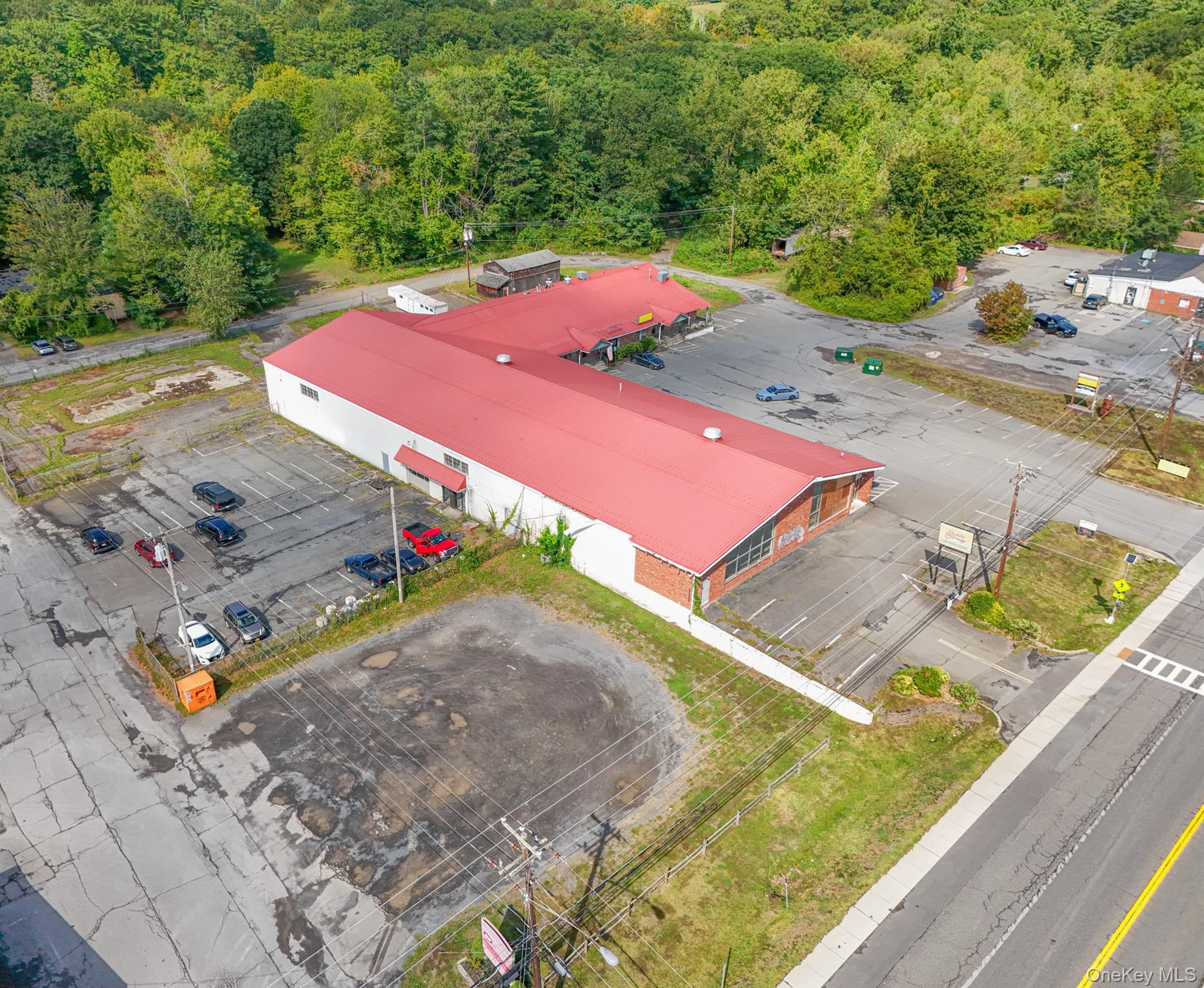 Drone / aerial view of a heavily wooded area