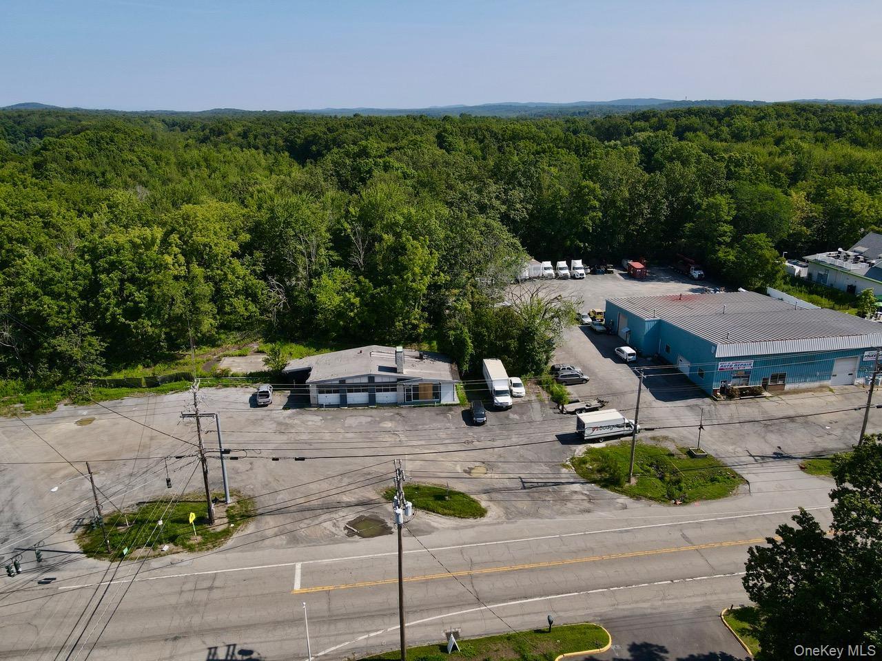 Drone / aerial view of a heavily wooded area