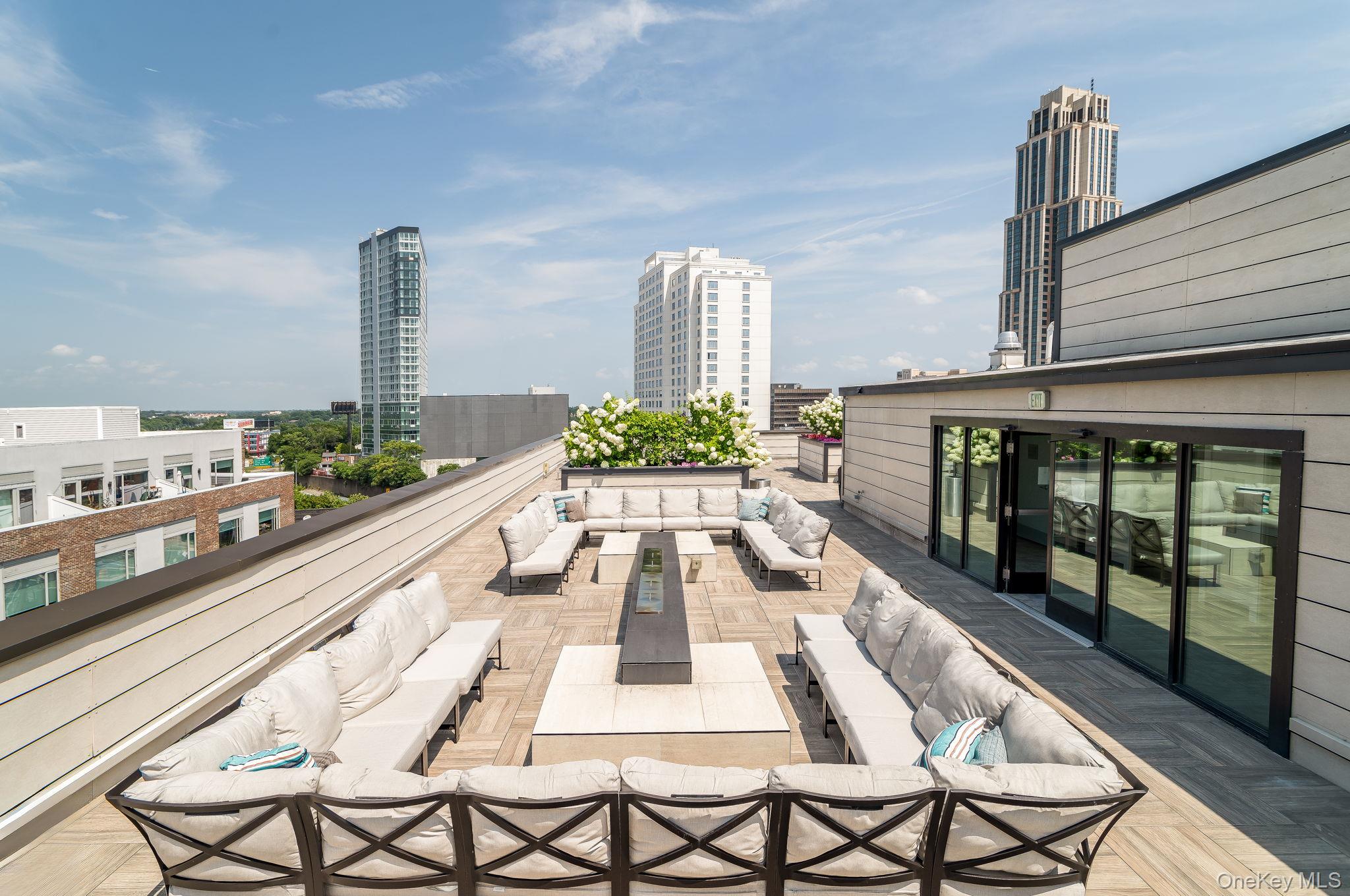 View of patio / terrace featuring outdoor lounge area and a city view