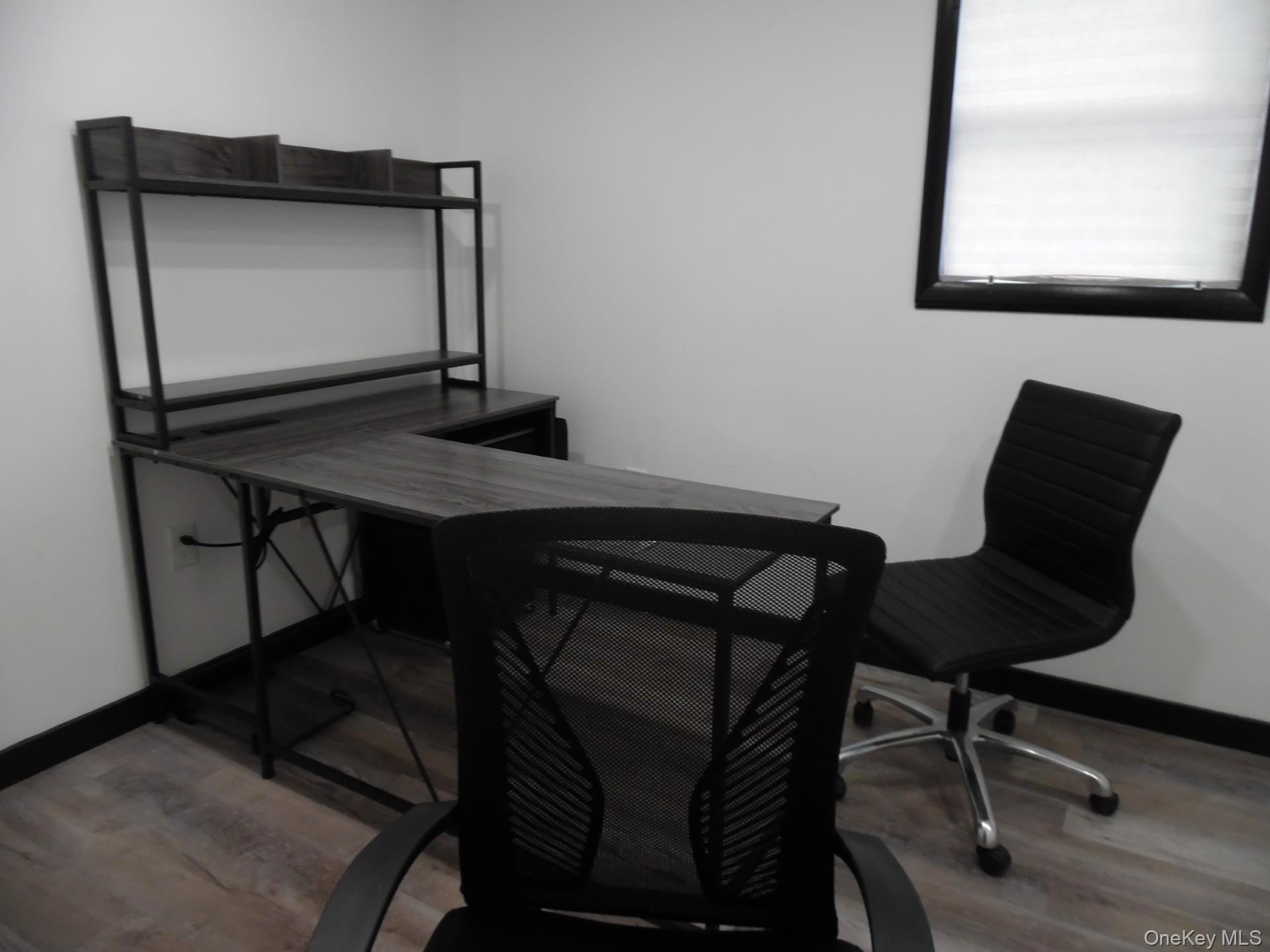 Office featuring light wood-style floors