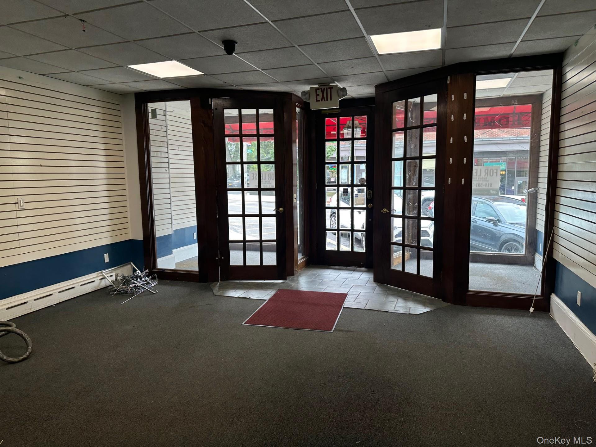 French Doors lead to 2 bay windows.