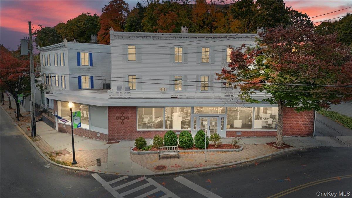 View of front of property with brick siding