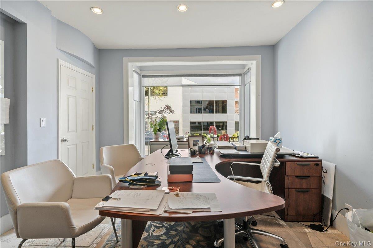 Dining space featuring recessed lighting and an office area